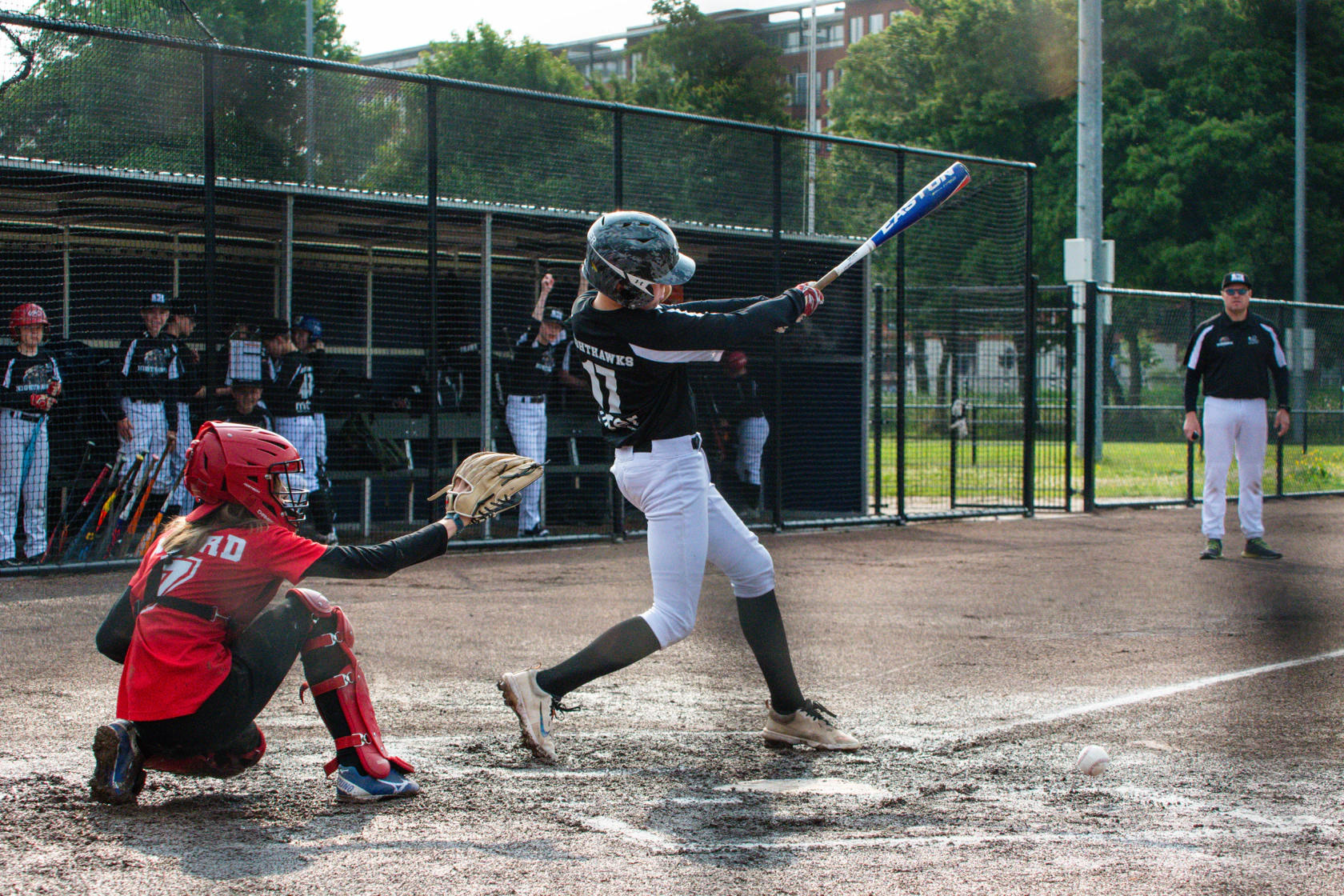 Little League batter at the plate ready to swing